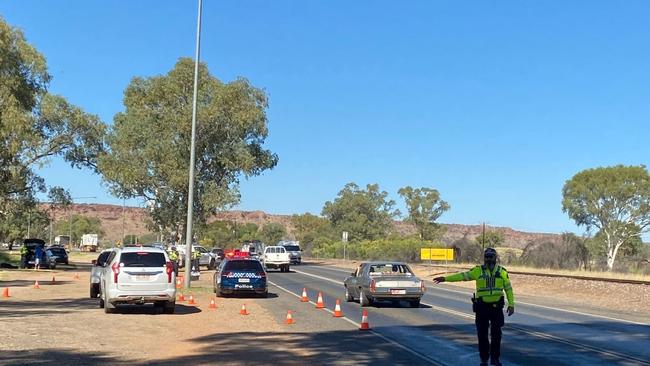 Northern Territory Police’s Southern Road Policing Unit conduct a random breath on Stuart Highway during RedCentreNATS 2024. Picture: NT Police