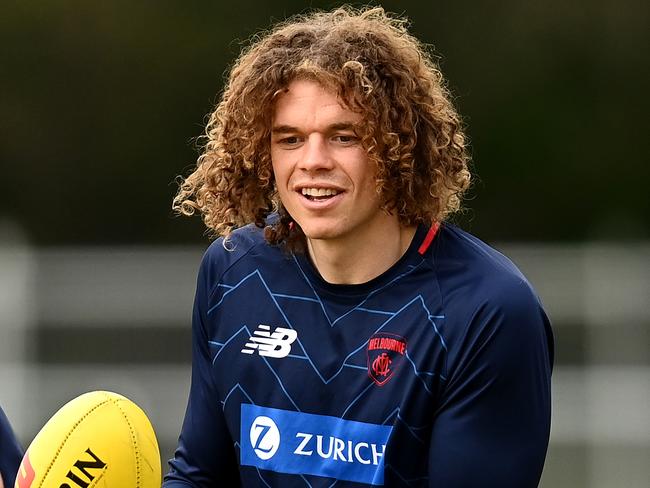 MELBOURNE, AUSTRALIA - MARCH 28: Ben Brown of the Demons handballs during a Melbourne Demons AFL training session at Gosch's Paddock on March 28, 2022 in Melbourne, Australia. (Photo by Quinn Rooney/Getty Images)