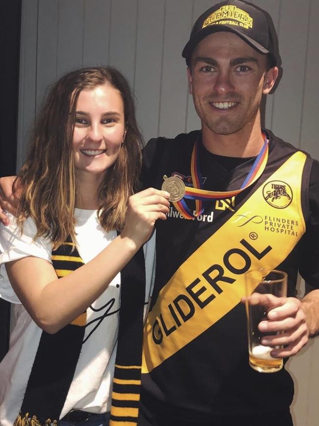 Luke Partington after winning the 2019 SANFL grand final with his sister Shae-Lea. Picture: Supplied