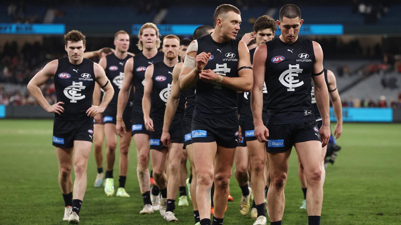 Patrick Cripps leads the Blues off the ground following the round 13 loss to Essendon. Picture: Michael Klein.