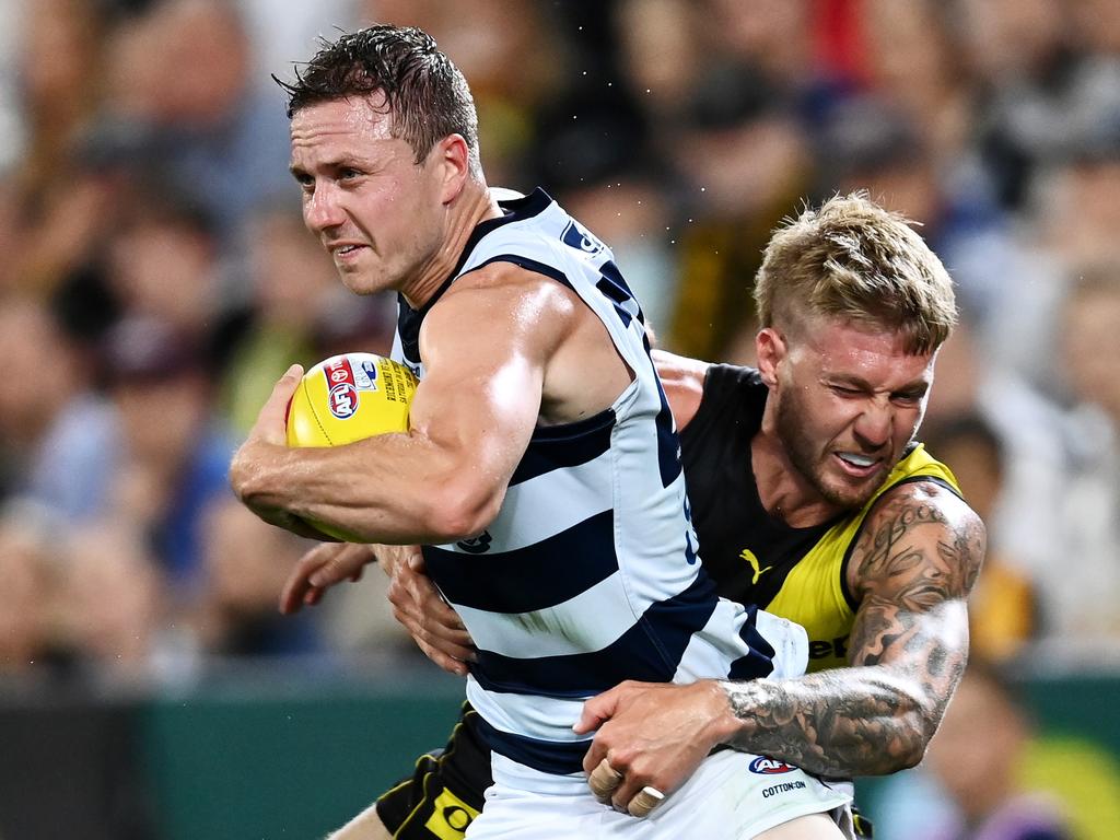 Nathan Broad puts the heat on Mitch Duncan in the Grand Final. Picture: Quinn Rooney/Getty Images