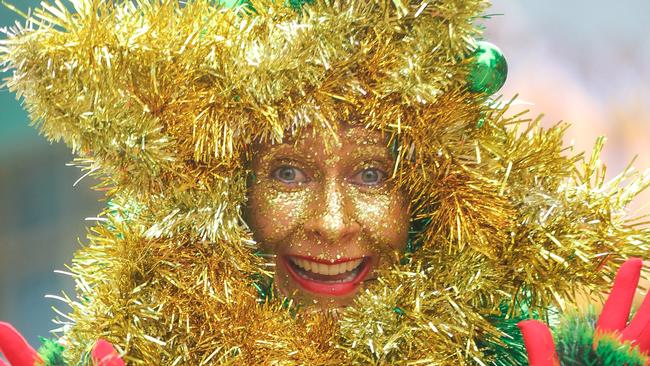 A walking Xmas Tree In the annual Christmas Pageant and Parade down the Esplanade and Knuckey StÃs.Picture: Glenn Campbell