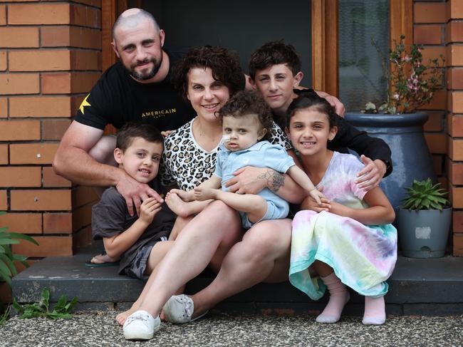 Harlen back home with his parents Kristy and Matt Busuttil and siblings Owen 5, Logan, 12, and Scarlet, 8. Picture: David Caird