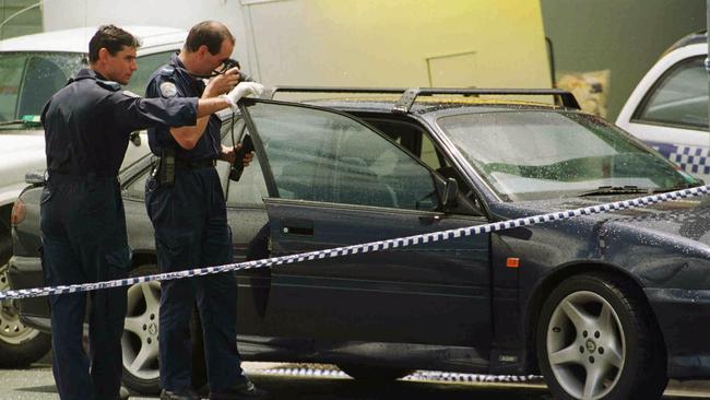 Police photograph car outside Teder Ave, Main Beach the morning after the murders.