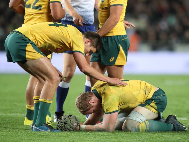 Jack Maddocks checks on a distressed David Pocock during the second Bledisloe Cup match between New Zealand and Australia at Eden Park. Picture: AAP Image