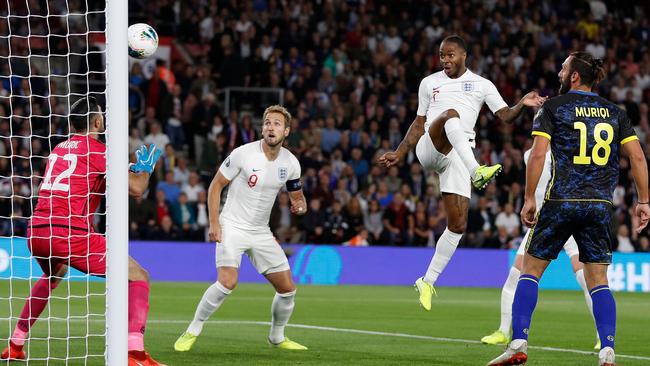 England’s Raheem Sterling, third from left, heads the ball home to score against Kosovo at St Mary’s Stadium in Southampton. Picture: AFP