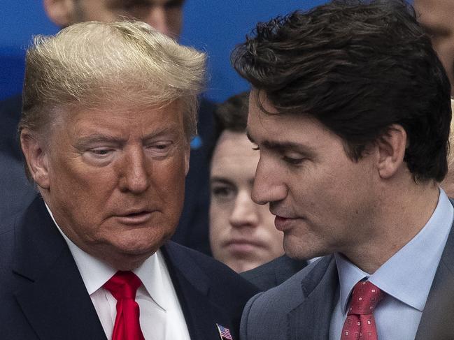 HERTFORD, ENGLAND - DECEMBER 04: U.S. President Donald Trump (L) ad Canadian Prime Minister Justin Trudeau (R) attend the NATO summit at the Grove Hotel on December 4, 2019 in Watford, England. France and the UK signed the Treaty of Dunkirk in 1947 in the aftermath of WW2 cementing a mutual alliance in the event of an attack by Germany or the Soviet Union. The Benelux countries joined the Treaty and in April 1949 expanded further to include North America and Canada followed by Portugal, Italy, Norway, Denmark and Iceland. This new military alliance became the North Atlantic Treaty Organisation (NATO). The organisation grew with Greece and Turkey becoming members and a re-armed West Germany was permitted in 1955. This encouraged the creation of the Soviet-led Warsaw Pact delineating the two sides of the Cold War. This year marks the 70th anniversary of NATO. (Photo by Dan Kitwood/Getty Images)