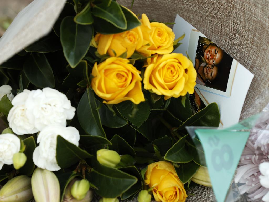 Floral tributes left near the scene of the horrific bus crash. Picture: Jonathan Ng