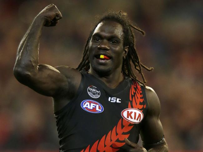 MELBOURNE, VICTORIA - MAY 13:  Anthony McDonald-Tipungwuti of the Bombers celebrates a goal during the round eight AFL match between the Essendon Bombers and the Geelong Cats at Melbourne Cricket Ground on May 13, 2017 in Melbourne, Australia.  (Photo by Darrian Traynor/AFL Media/Getty Images)