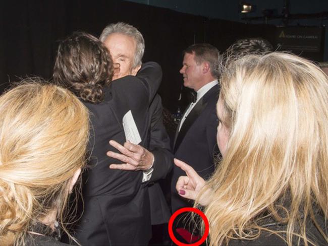 Note the red circle — let’s zoom in. Picture: Andrew H. Walker/REX/Shutterstock
