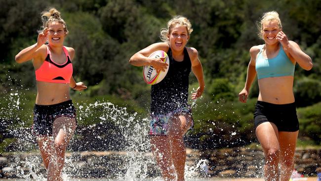 Australian players Brooke Anderson, Georgina Friedrichs and Emma Tonegato during a training session at Narrabeen Beach. Pic: Gregg Porteous