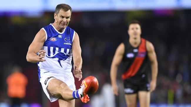 Wayne Carey and Matthew Lloyd during a charity fundraising event in a match between North Melbourne Kangaroos and Essendon Bombers in Melbourne in 2019. Picture: Julian Smith