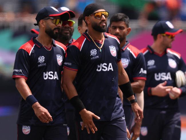 NEW YORK, NEW YORK - JUNE 12: Players of the USA react following the ICC Men's T20 Cricket World Cup West Indies & USA 2024 match between USA and India at Nassau County International Cricket Stadium on June 12, 2024 in New York, New York.   Robert Cianflone/Getty Images/AFP (Photo by ROBERT CIANFLONE / GETTY IMAGES NORTH AMERICA / Getty Images via AFP)