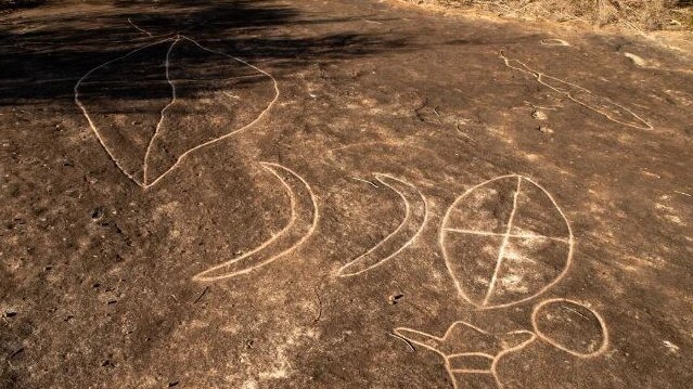 Some of the ancient Aboriginal rock carvings on the Engravings Track. Picture: Sydney Rock Art