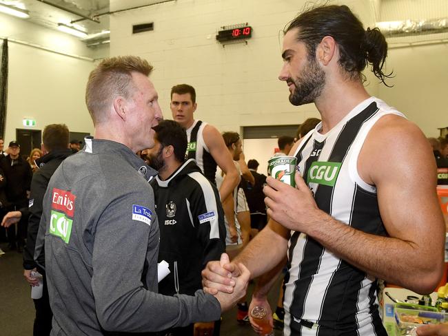 Collingwood Coach Nathan Buckley with Brodie Grundy