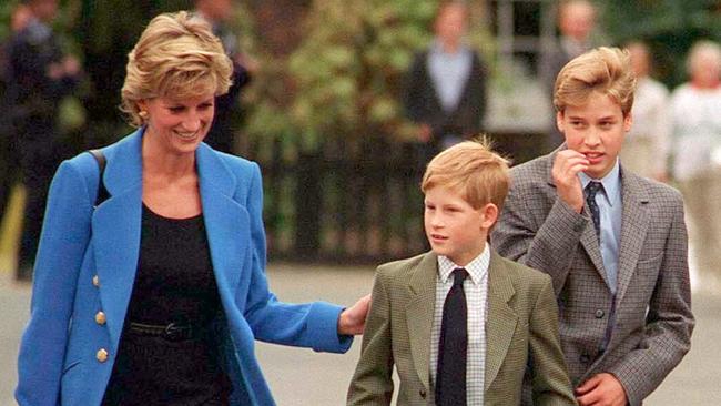 Prince William with Diana, Princess of Wales and Prince Harry on the day he joined Eton in September 1995. Picture: Anwar Hussein/WireImage