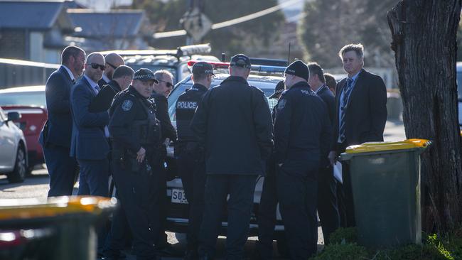 Detectives at the scene. Picture: Mark Brake