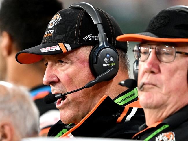 BRISBANE, AUSTRALIA - APRIL 01: Coach Tim Sheens of the Tigers looks frustrated as he is seen on the sidelines calling out instructions during the round five NRL match between Brisbane Broncos and Wests Tigers at Suncorp Stadium on April 01, 2023 in Brisbane, Australia. (Photo by Bradley Kanaris/Getty Images)