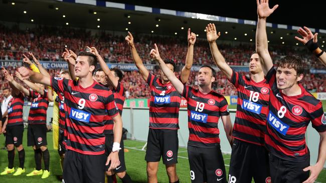 Wanderer's Tomi Juric and team mates celebrate with fans after full time in the Asian Champions League 2014 final between Western Sydney Wanderers and Al Hilal at Pirtek Stadium,Parramatta .Picture Gregg Porteous