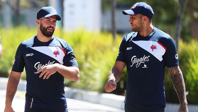 Sydney Roosters signing James Tedesco walks to a closed training session at Moore Park with Blake Ferguson. Picture: Brett Costello