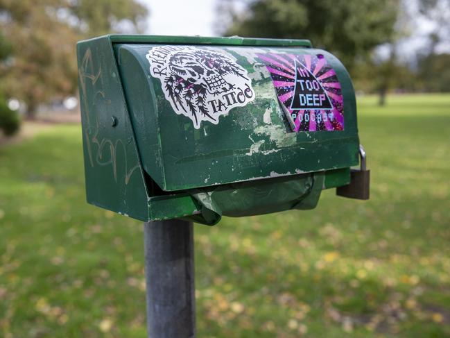 One of many dog poo bag dispensers scattered across the park.