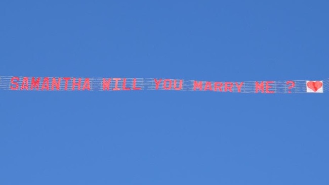 The banner used for the proposal of Samantha Croucher and Troy Cartledge in 2015.