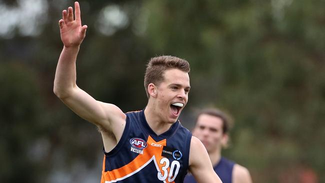 Mitchell Podhajski of Calder celebrates a goal during the TAC Cup match between the Calder Cannons and Bendigo Pioneers played at Cragieburn on Sunday 25th June, 2017. Picture: Mark Dadswell