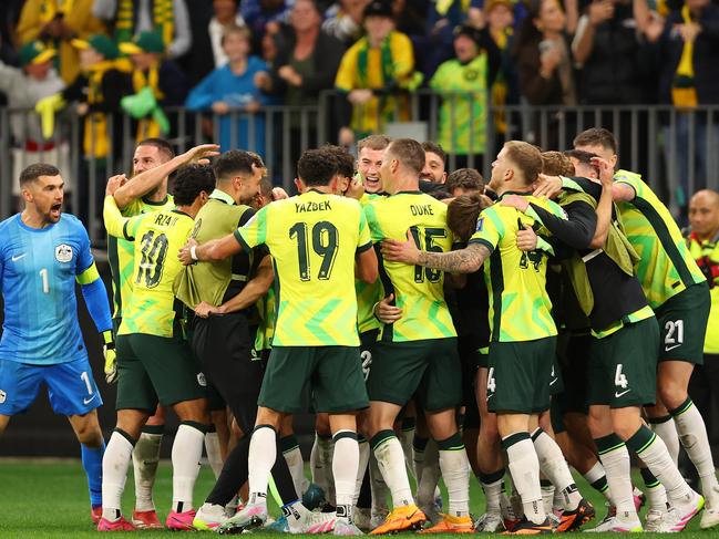 PERTH, AUSTRALIA - JUNE 05: The Socceroos celebrate a goal during the 2026 FIFA World Cup Round Three AFC Asian Qualifier match between Australia Socceroos and Japan at Optus Stadium on June 05, 2025 in Perth, Australia. (Photo by Paul Kane/Getty Images)