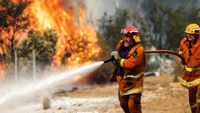 St Marys TFS volunteers during back burning operations at Fingal. PICTURE CHRIS KIDD