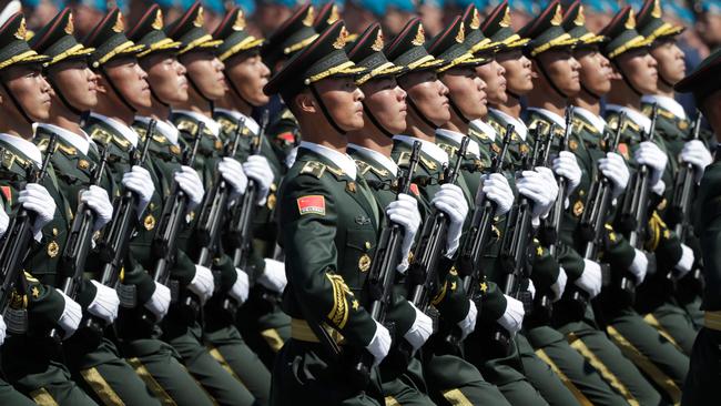 Soldiers from China's People's Liberation Army march on Red Square in Beijing. Picture: AFP