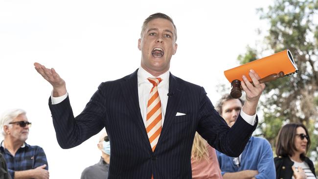 Auctioneer Jake Moore in action in Coogee. Picture: NCA NewsWire / Monique Harmer