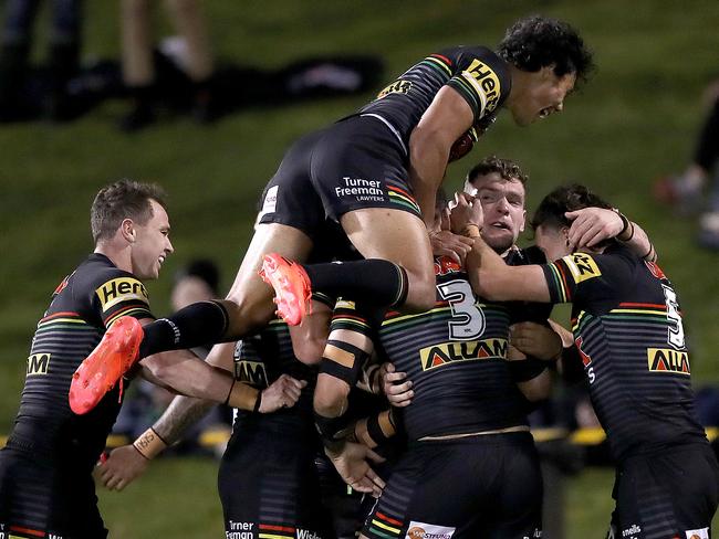 SYDNEY, AUSTRALIA - AUGUST 21: Liam Martin of the Panthers celebrates after scoring a try during the round 15 NRL match between the Penrith Panthers and the Cronulla Sharks at Panthers Stadium on August 21, 2020 in Sydney, Australia. (Photo by Mark Kolbe/Getty Images)