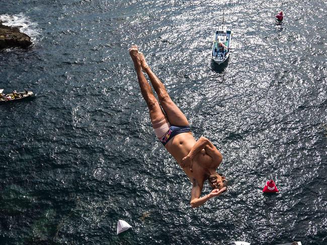 Orlando Duque of Colombia diving from the 28 metre platform during the eighth stop of the Red Bull Cliff Diving World Series at Shirahama, Japan. Picture: AFP PHOTO / RED BULL / Romina AMATO