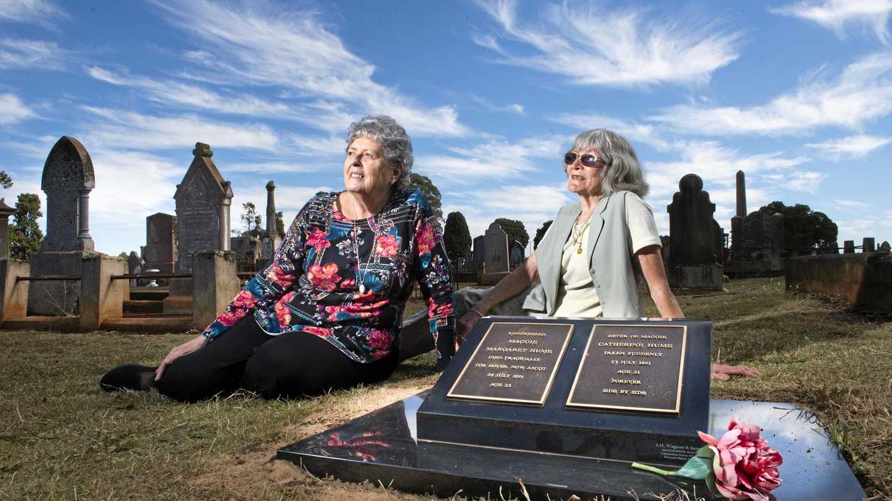 Jillian Lean and Lois Jackman at the grave of Maggie Hume, the ghost of Ascot House. Wednesday, 16th May, 2018. Picture: Nev Madsen