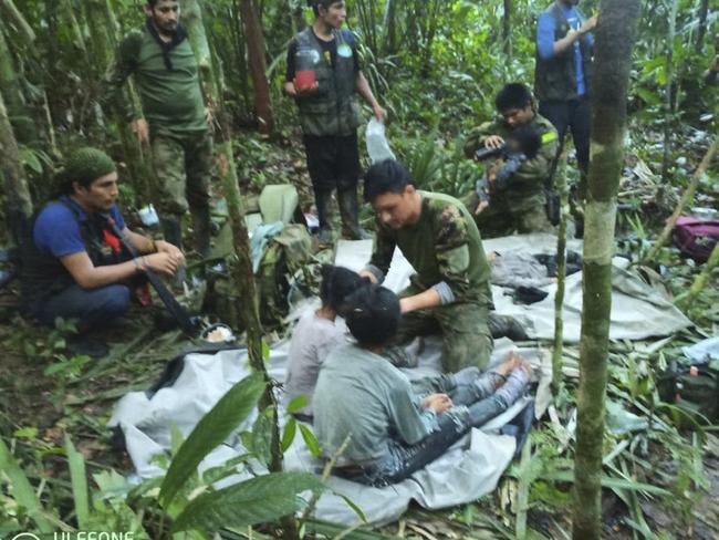 The childrenafter being found alive by the army. Picture: PRENSA PRESIDENCIA / Colombian Presidency / AFP