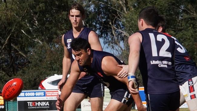 AFL Yarra Ranges Div 2 Semi Final between Seville and Powelltown. Powelltown 15.14 (104) defeated Seville 13.17 (95). 300th senior game for Seville’s Shane Senior as he attacks the ball. Picture: Robyn Kuys