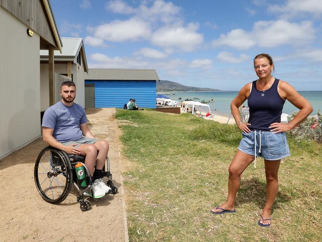 Vivian  Jankovski with her son Ben at Safety Beach where there is no wheelchair access. Picture: Ian Currie