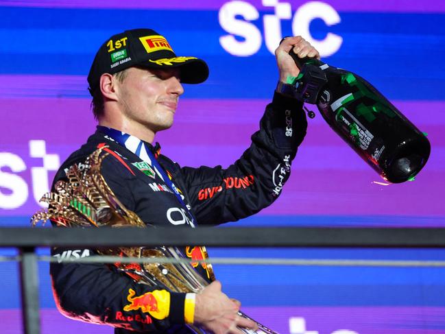 Red Bull Racing's Max Verstappen celebrates during the podium ceremony after winning the Saudi Arabian Formula 1 Grand Prix. Picture: AFP