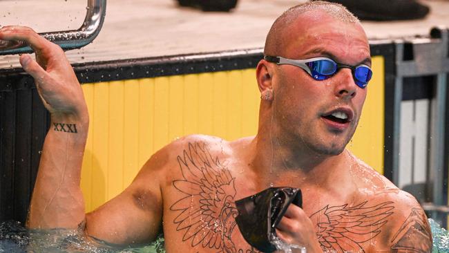 Australia’s Kyle Chalmers reacts after winning the men's 50 metre butterfly final at the 2022 Australian Swimming Championships in Adelaide on May 19, 2022. (Photo by Brenton Edwards / AFP)