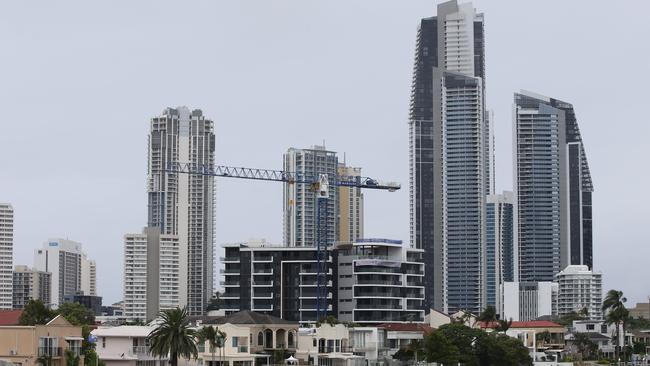 Storm clouds gather around the high rises of Surfers Paradise, as body corporate battles loom. Picture: Glenn Hampson