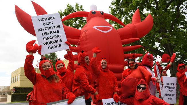 Protesters outside the Liberal Party's official state election campaign launch. AAP Image/James Ross