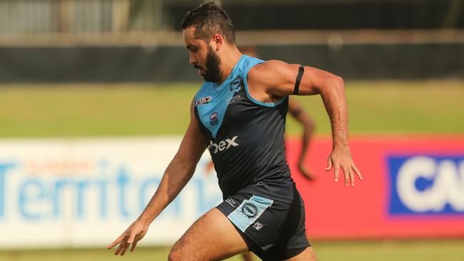 Jarrod Stokes in typical pose as he bursts away from the pack. Picture: GLENN CAMPBELL