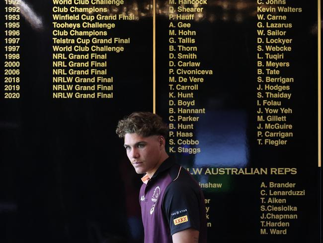 Reece Walsh walks past the wall of champions at Brisbane Broncos HQ. Picture: Liam Kidston