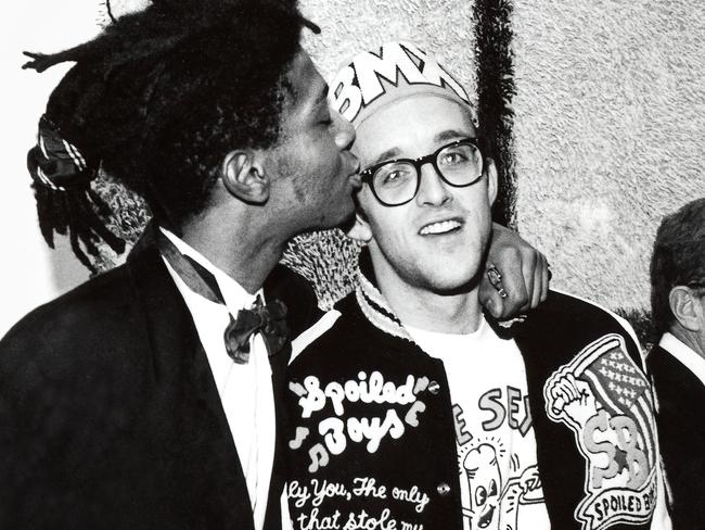 Keith Haring and Jean-Michel Basquiat at the opening reception for Julian Schnabel at the Whitney Museum of American Art, New York, 1987. Picture: George Hirose