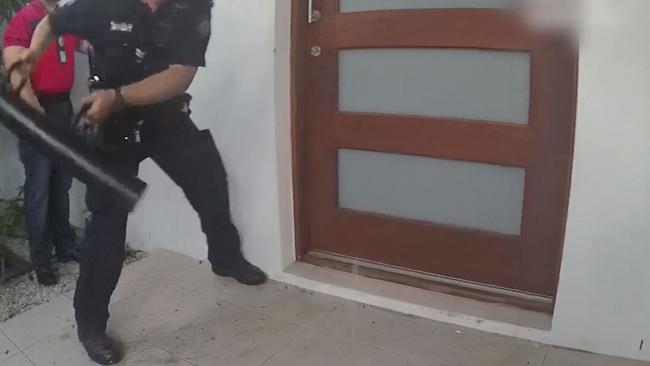 Images from a police video of a raid on a Gold Coast house as part of Operation Romeo Ionic.