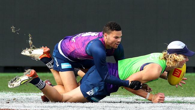 Brandan Parfitt tackles Sam De Koning at training this week. Picture: Alison Wynd