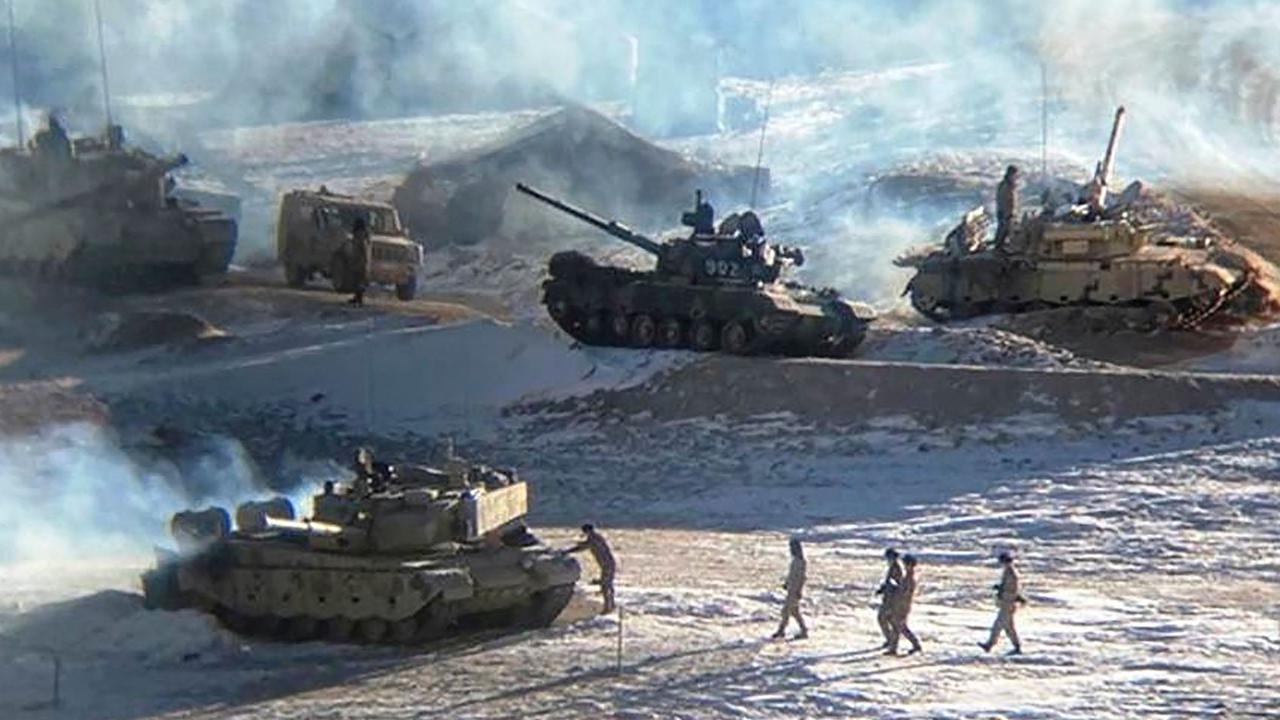 People’s Liberation Army soldiers and tanks seen during military disengagement along the Line of Actual Control at the India-China border. Picture: Indian Ministry of Defence/AFP