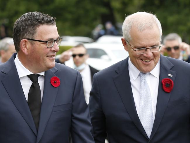 Daniel Andrews and Scott Morrison talk ahead of the Remembrance Day service at the Shrine of Remembrance in Melbourne last week. Picture: Getty Images