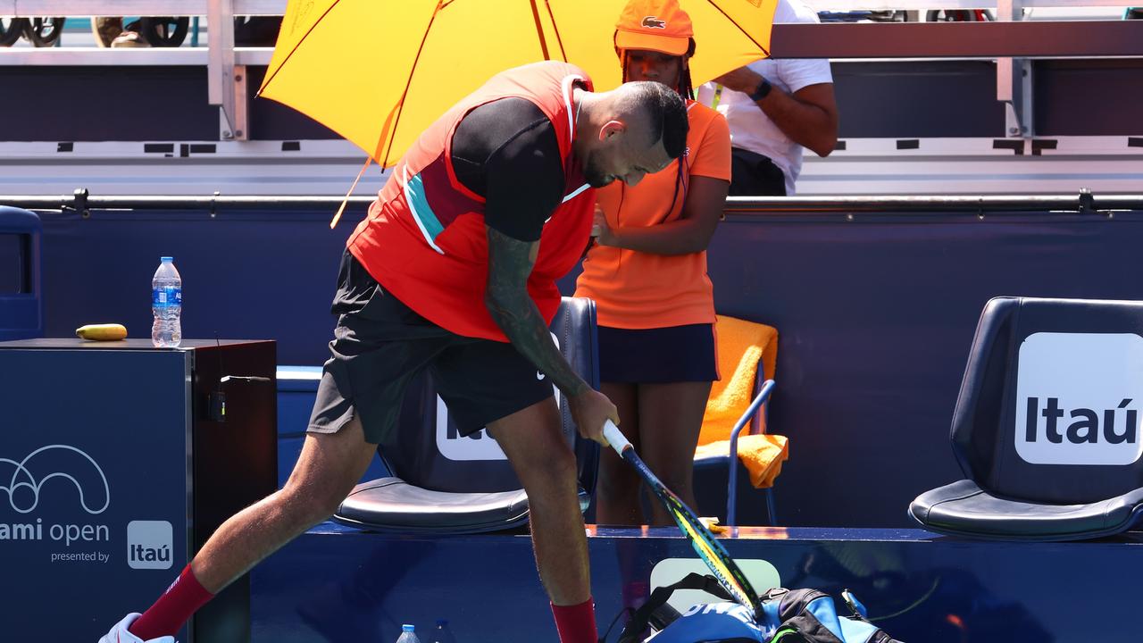 It’s a tough life being Nick’s racquet. (Photo by Michael Reaves/Getty Images)