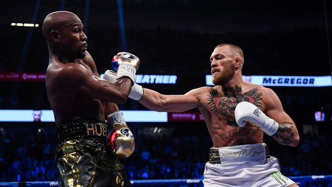 Conor McGregor and Floyd Mayweather Jr during their superfight at T-Mobile Arena in Las Vegas. Picture: Stephen McCarthy/Sportsfile via Getty